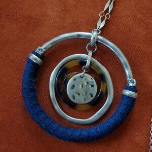 Very long statement pendant necklace